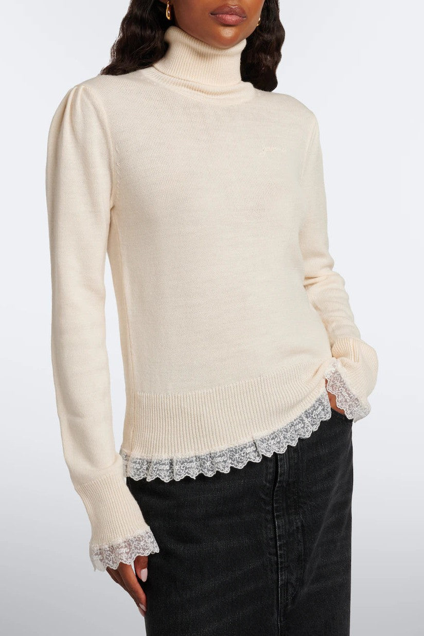 Pull col roulé Merino
