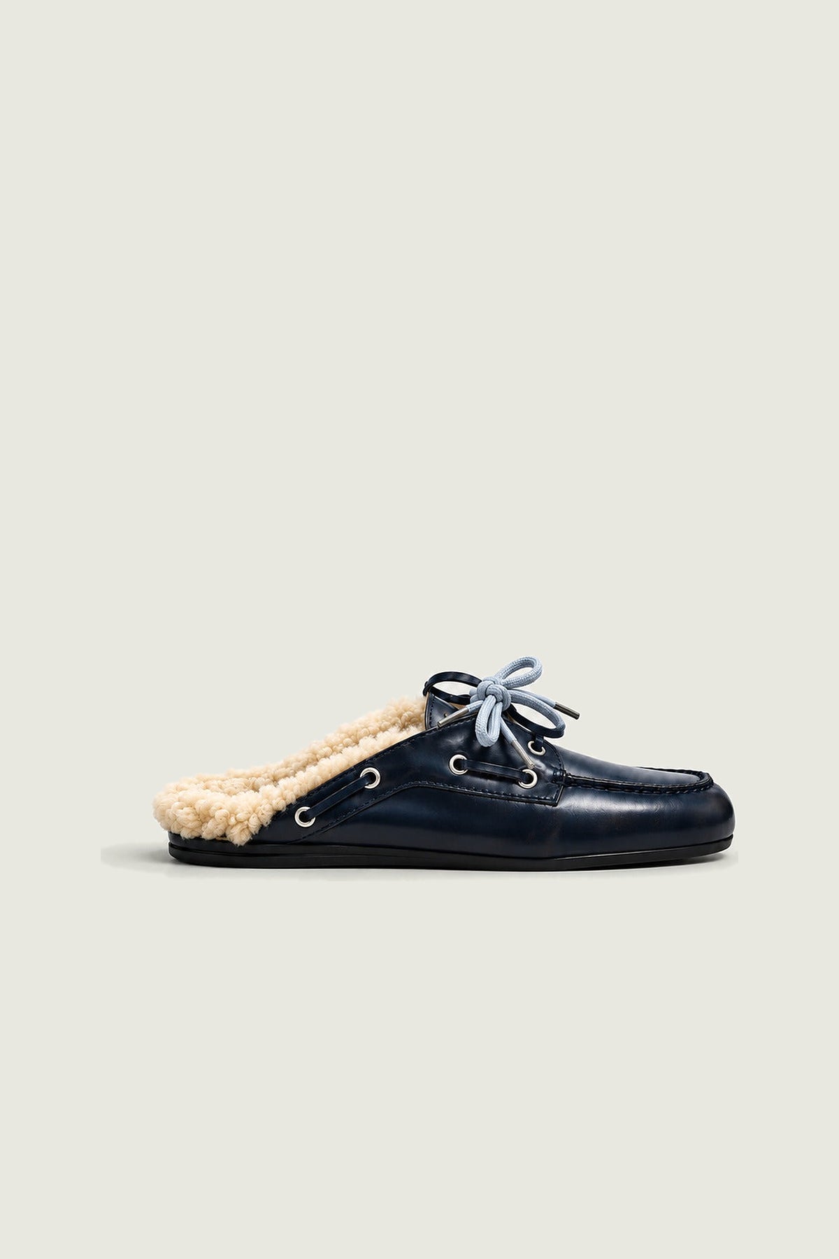 Mules fourrées en cuir Posa, bleu nuit, vue de profil